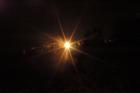 Flare through trees - just below the site